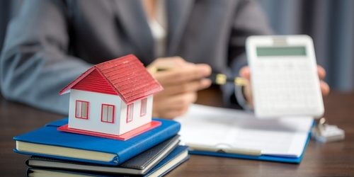 Woman,Home,Sales,Person,Is,Checking,Documents,For,House,Purchase