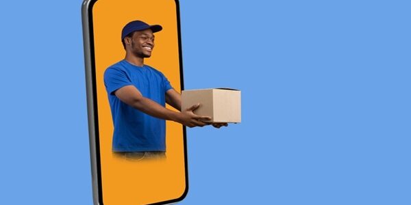 Parcel,Shipping,App.,Black,Deliveryman,In,Phone,Screen,Giving,Cardboard